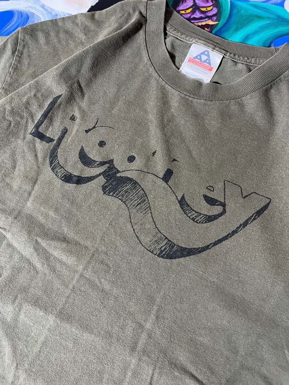 Vintage Rodney Olive Green Graphic T-Shirt with Palm Tree Print